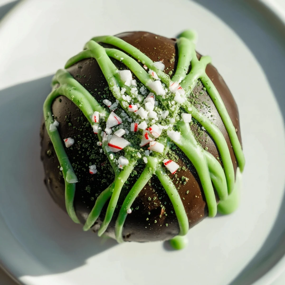 Perfect little Matcha Dark Chocolate Peppermint Truffles, ready to eat, showing off a delicate peppermint aroma.