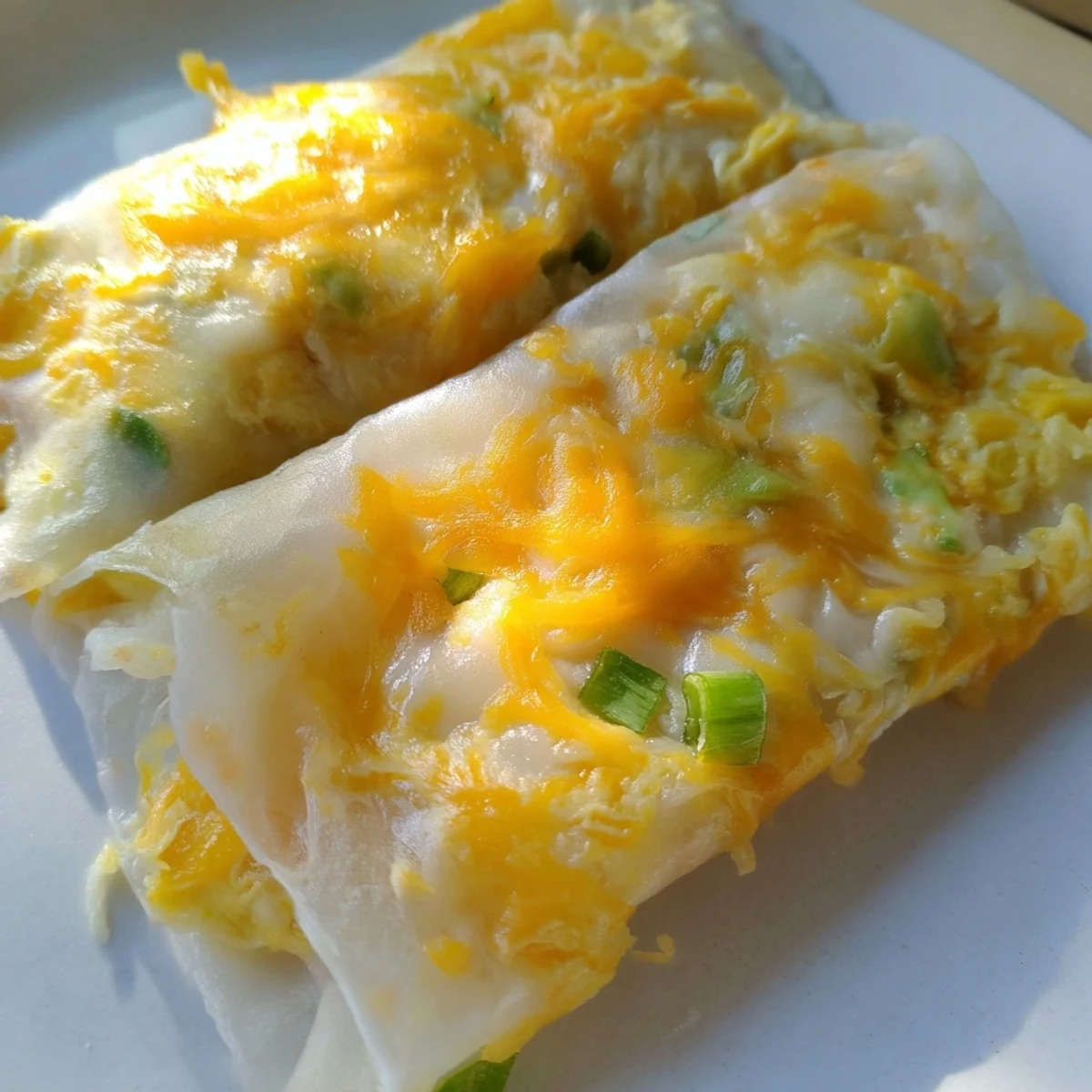Crispy edges and a cheesy center make this inviting Rice Paper Egg & Cheese Fold a winner.