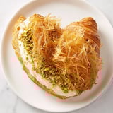 Close-up of baked Pistachio Cream Croissants: crispy phyllo tops contrast with the green, smooth cream filling.