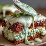 A Japanese twist on classic Italian tiramisu, featuring layers of matcha-infused ladyfingers and rich mascarpone cream.  