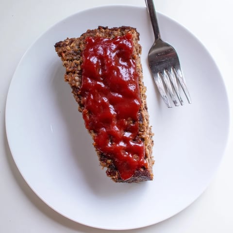 Tender, golden brown Effortless Stove Top Stuffing Meatloaf, ready to slice and serve for dinner.