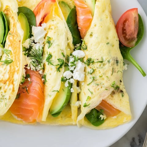 Fluffy, golden Blender-Egg Crepe Wrap, filled with savory smoked salmon and creamy avocado slices.