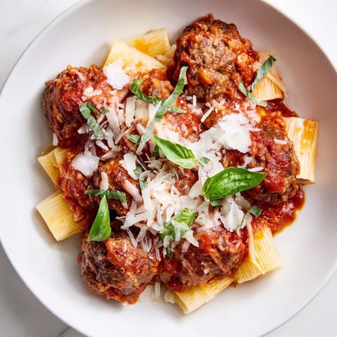 Close-up of a rustic, one-pan Italian Meatball Pasta Skillet, ready for a comforting meal.