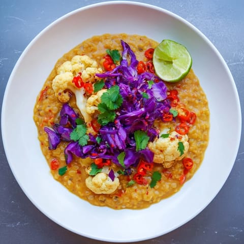 Creamy coconut milk and fragrant spices coat the tender vegetables in this flavorful red cabbage dhal.