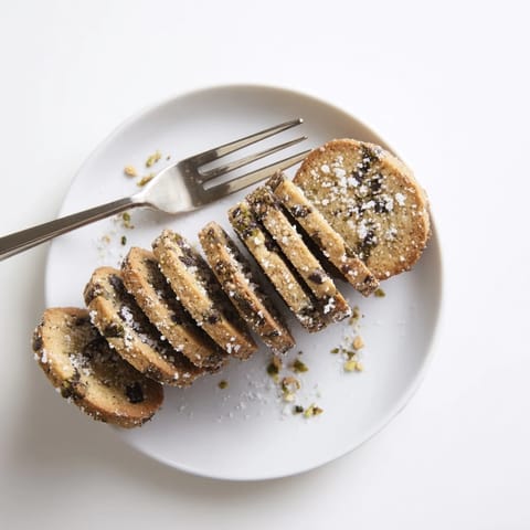Beautifully golden Salted Pistachio Chocolate Chunk Shortbread, perfect for a special treat with a delicate sea salt finish.