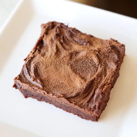 These rich, dark Pumpkin Workout Brownies are chilling, promising a delightful, low-carb dessert.