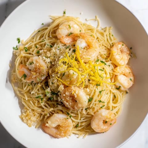 Golden, perfectly cooked One-Skillet Lemon Garlic Shrimp Angel Hair Pasta, ready to savor.