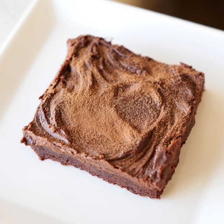 These rich, dark Pumpkin Workout Brownies are chilling, promising a delightful, low-carb dessert.