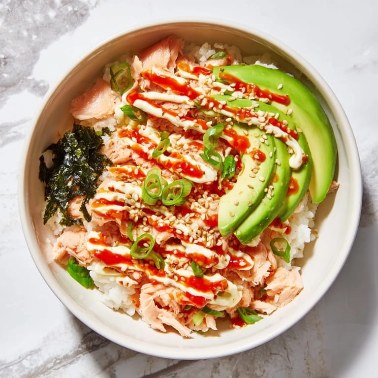Serving suggestion for Emily Mariko Salmon Rice Bowl with crispy nori sheets for wrapping and dipping.