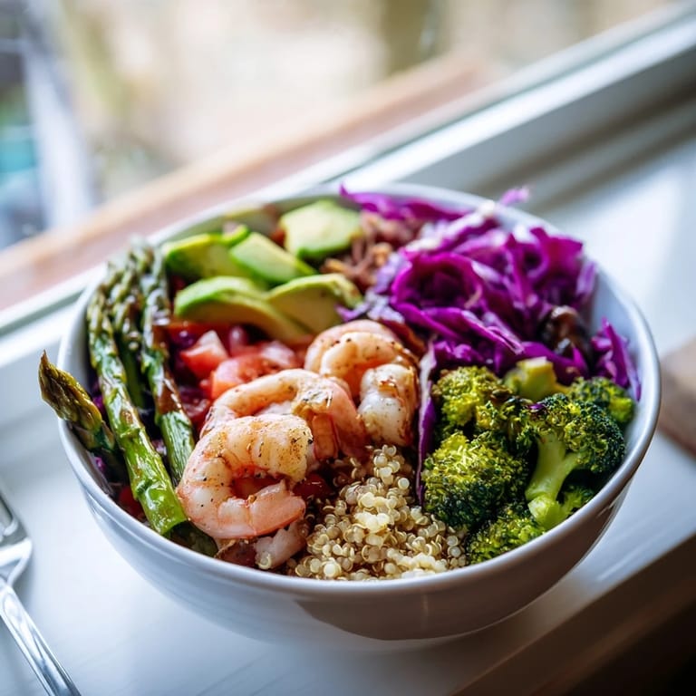 Vibrant sections of shrimp, quinoa, and fresh vegetables make this Detox Buddha Bowl a perfect, satisfying lunch or dinner.