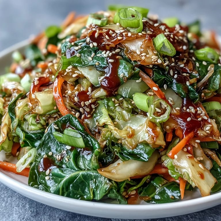 Close-up of Hot and Sour Cabbage with tender-crisp textures and bold, savory aromas, ready to serve as a flavorful vegan side dish.